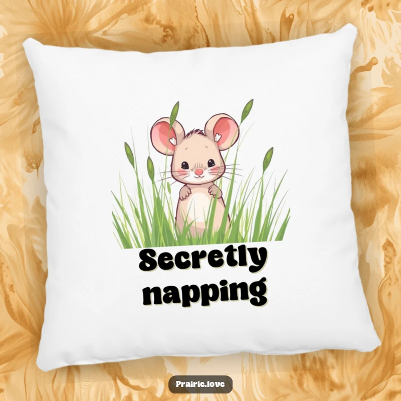Funny pillow with a sweet mouse peeking from tall, wispy prairie grass, offering comfort and a delightful visual gag.