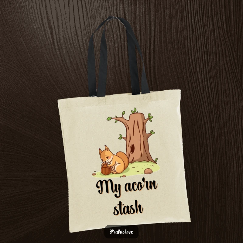 Funny tote bag with a determined squirrel burying an acorn near a stylized tree, carrying supplies smartly.